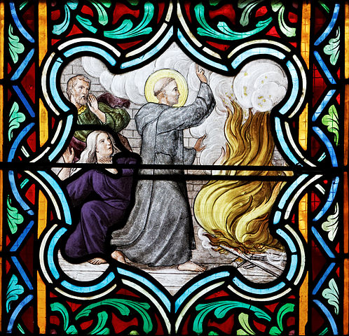 St Anselm extinguishing a fire with the sign of the cross. Photo by Thesupermat - Own work, CC BY-SA 3.0, https://commons.wikimedia.org/w/index.php?curid=28362078 (details)